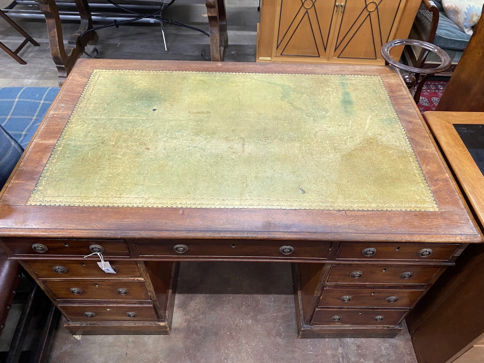 A small Victorian mahogany pedestal partner's desk, length 137cm, depth 90cm, height 76cm